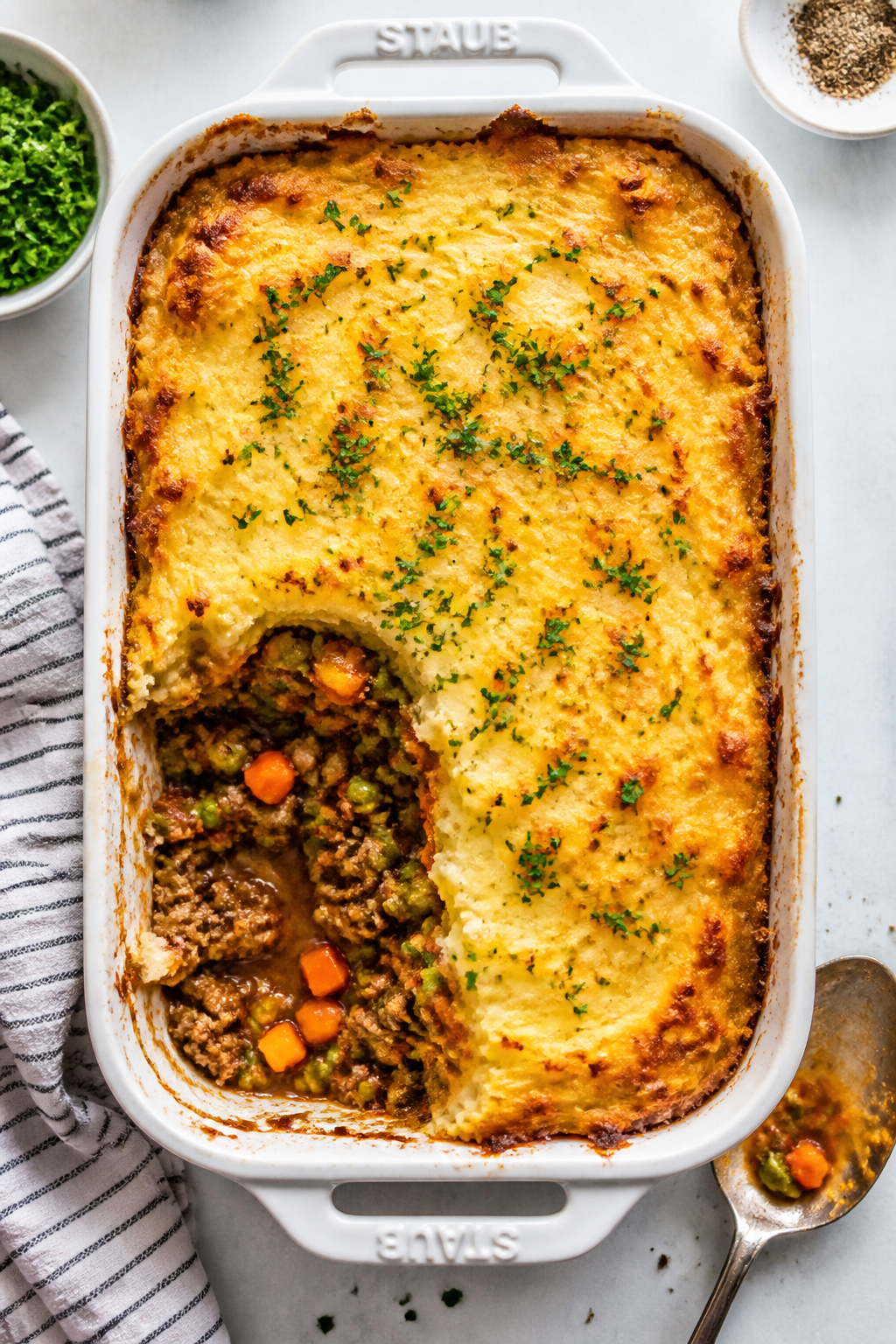 Tasty top view, final dish: Overhead shot of Easy Cauliflower Shepherd’s Pie in a 9x13 baking dish