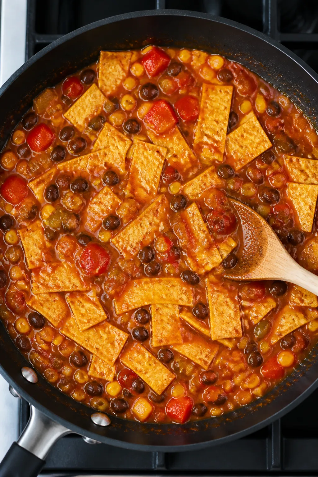 Cooking process: Overhead shot of the “build the skillet” stage—simmering mixture in a wide no