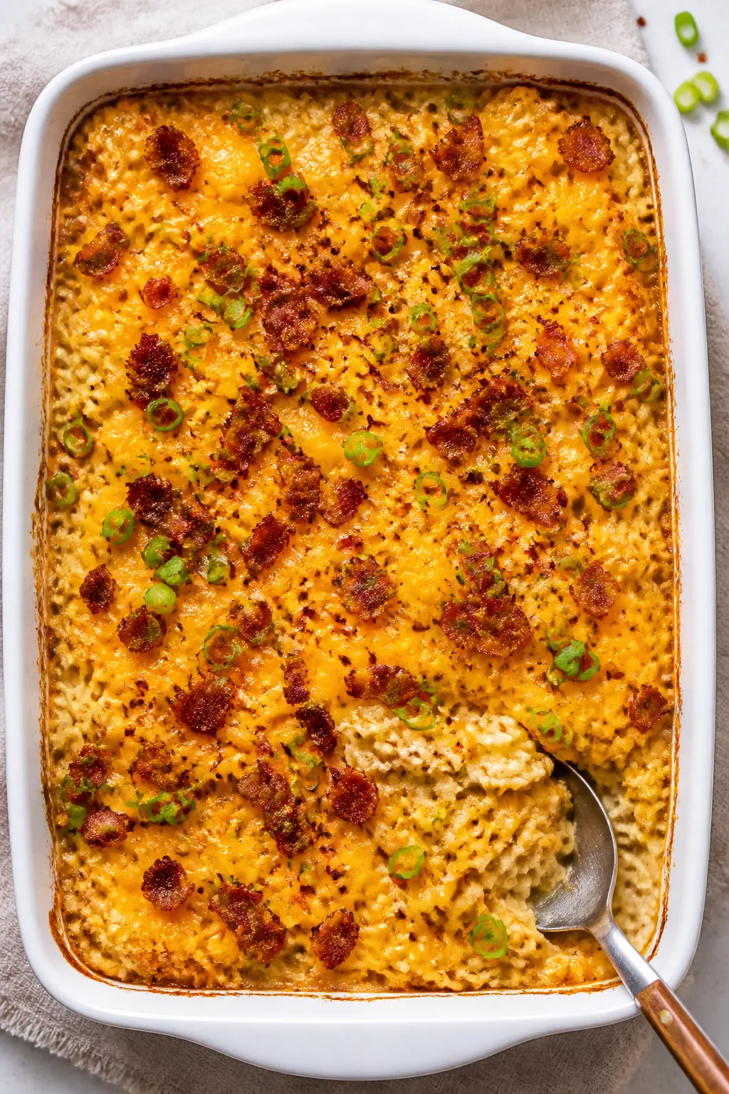 Overhead shot of Crack Chicken Ramen Casserole just out of the oven, uncovered and bubbling at the e