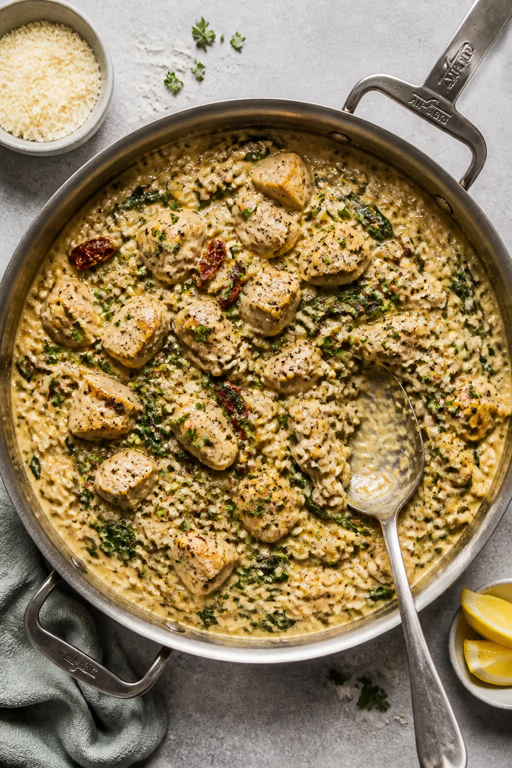 Tasty top view — Overhead shot of the one-pan Creamy Tuscan Chicken and Rice just off the heat: sp