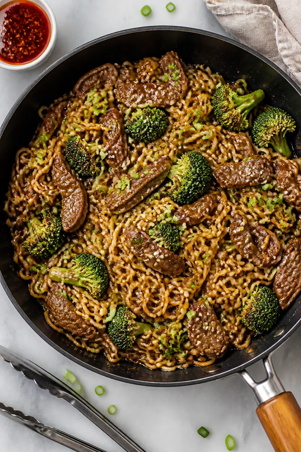 Tasty weeknight comfort: Overhead shot of a family-style skillet of finished Beef and Broccoli Ramen